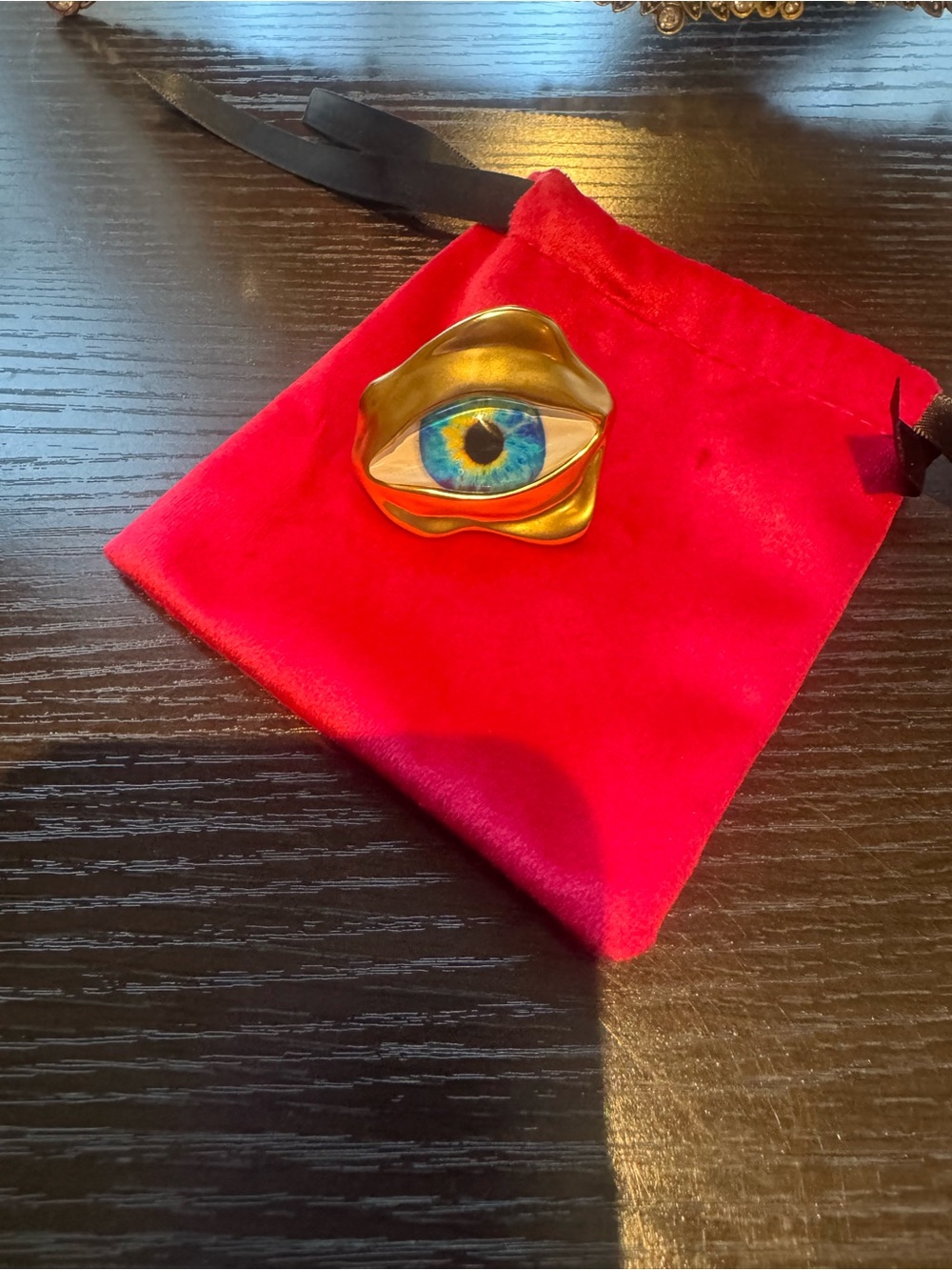 Schiaparelli  gold tone Eye Statement Ring with Blue Center adjustable